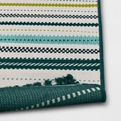 7'x10' Textural Stripe Rectangular Woven Outdoor Area Rug Light Green - Threshold™ 5 7'x10' Textural Stripe Rectangular Woven Outdoor Area Rug Light Green - Threshold™ -Threshold GUEST 8fbba8c2 1ff0 42bf 8161 a2f29c8eb282